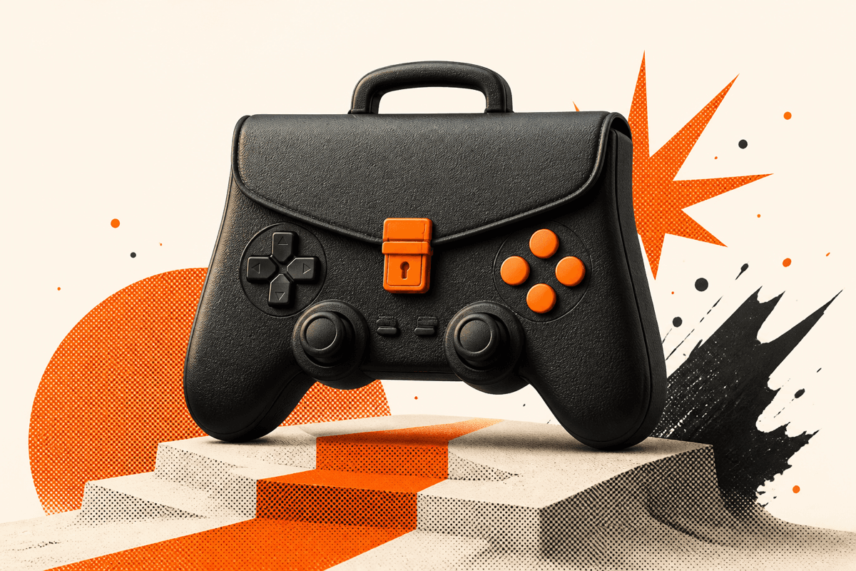 Black game controller shaped like a briefcase with an orange latch, resting on stone steps against an orange starburst